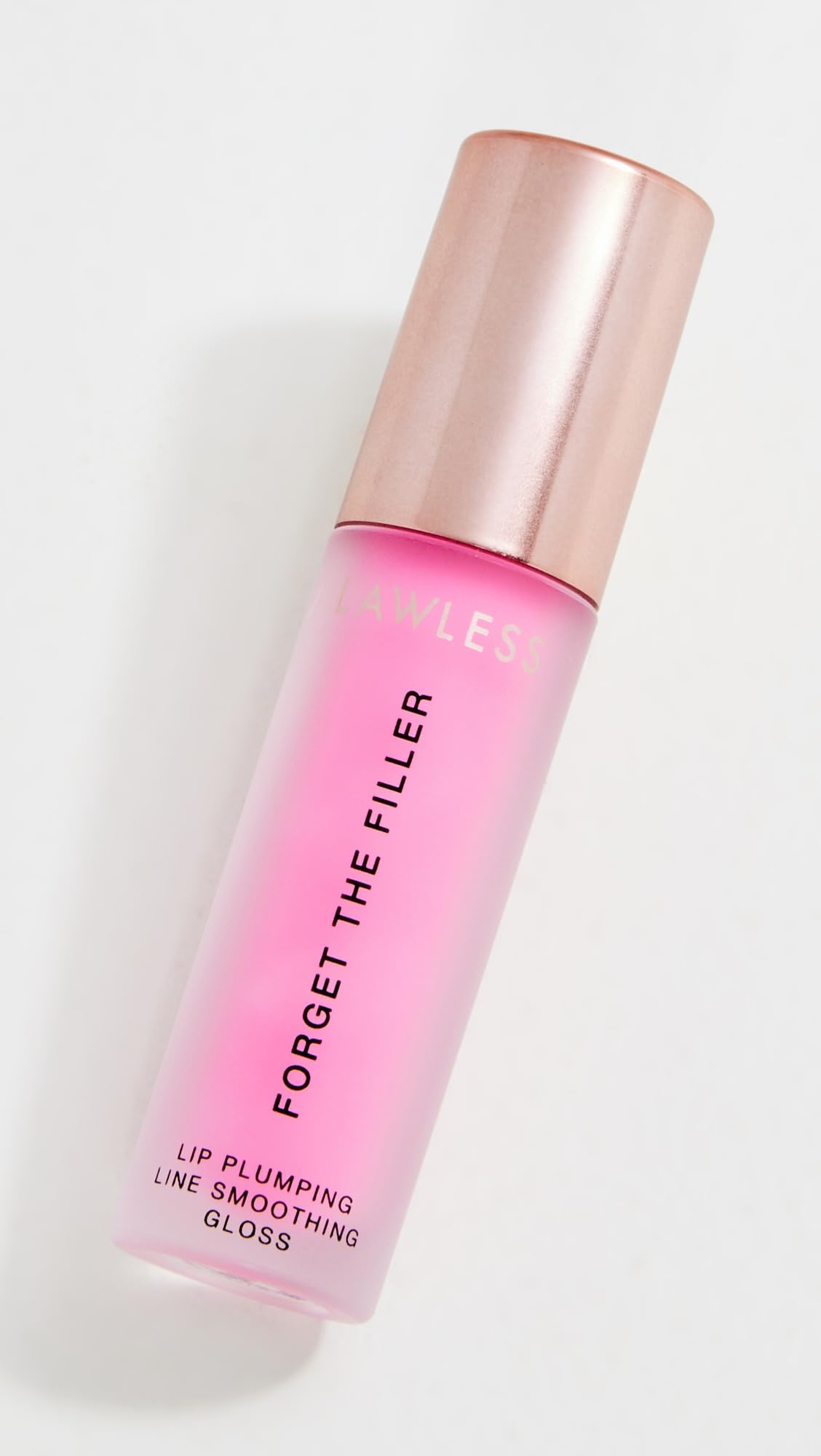 Close-up of Daisy Pink applicator applying sheer, silky color for shine.