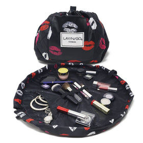 Lay-n-Go Cosmo bag opened to lay flat for quick access to cosmetics.