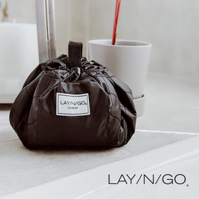 Lay-n-Go Cosmo bag with zip pocket keeps essentials organized during travel.