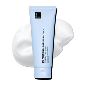 Layerlab face wash in blue bottle with rich foam for deep cleansing.