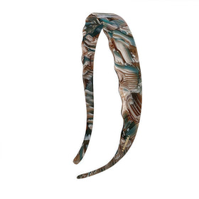LAYONGMOLI acetate headband in blue marble pattern for secure all-day wear.