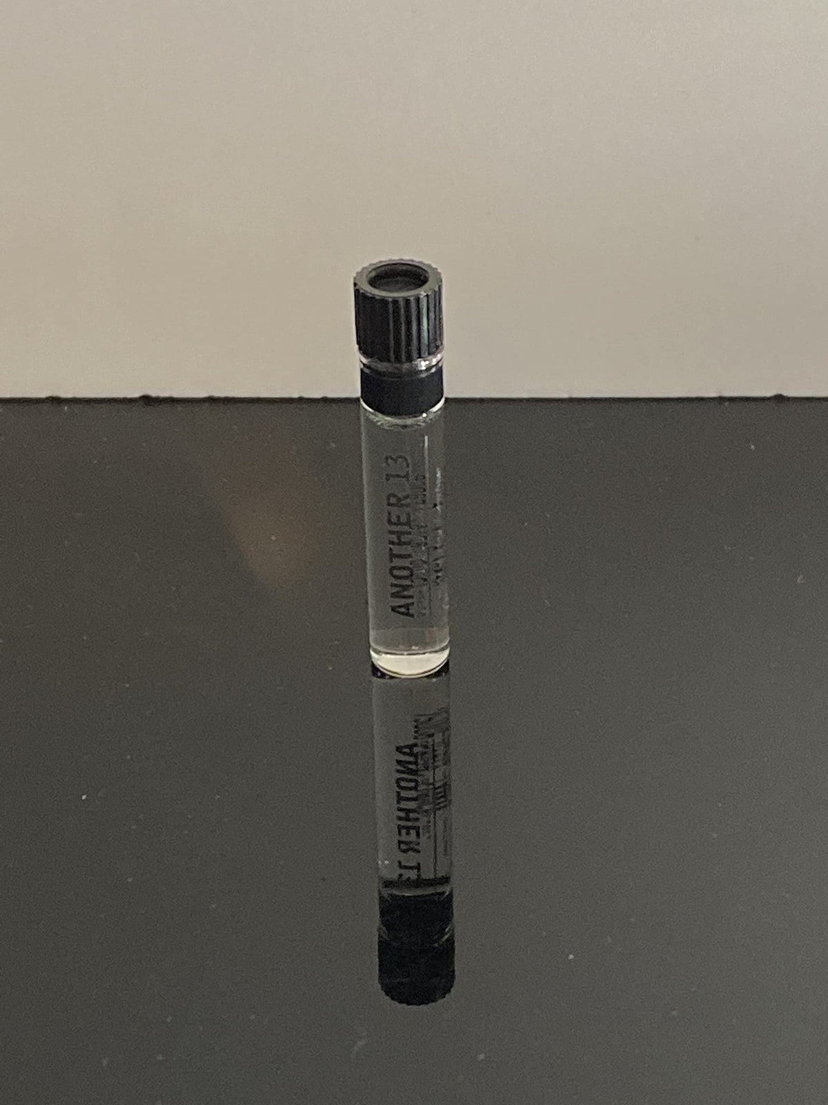 Le Labo AnOther 13 sample vial packaging, compact travel-friendly design.