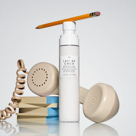 Le Monde Gourmand Fresh Mist bottle showing bergamot top notes for an uplifting lift.