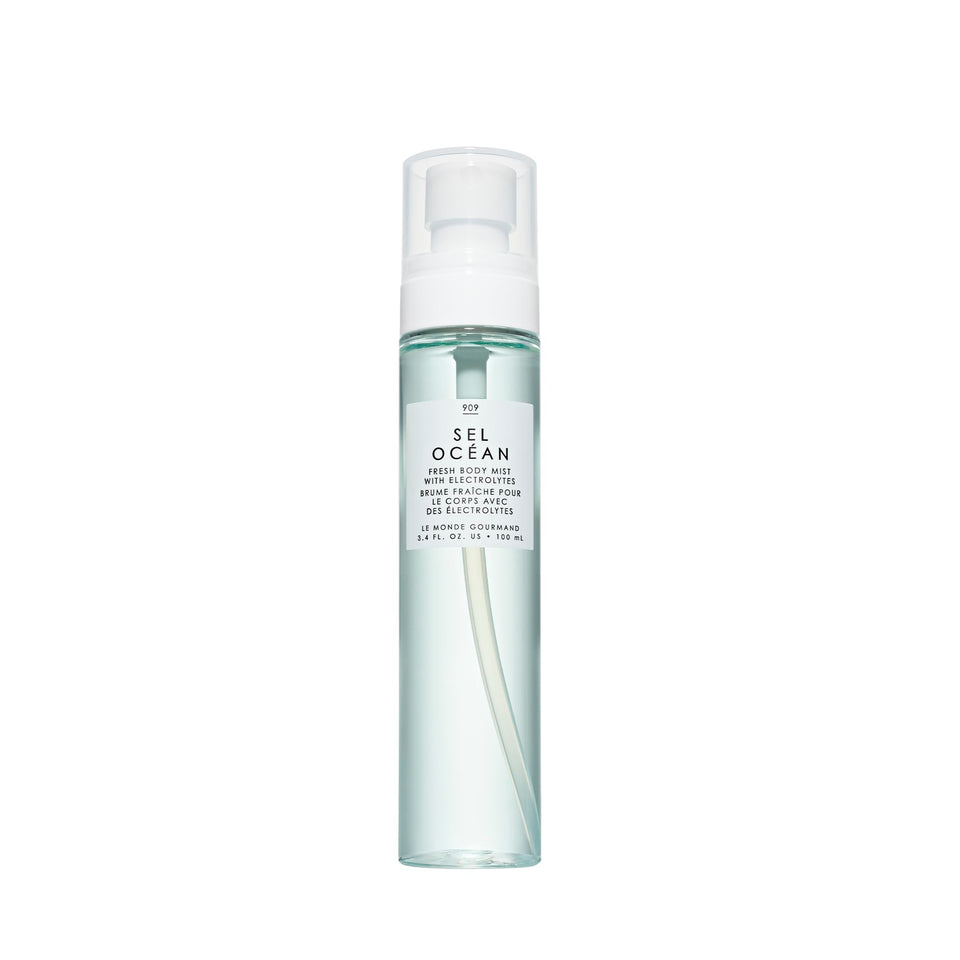Le Monde Gourmand Sel Océan Fresh Mist bottle bathed in sunlight for all-day refreshment.