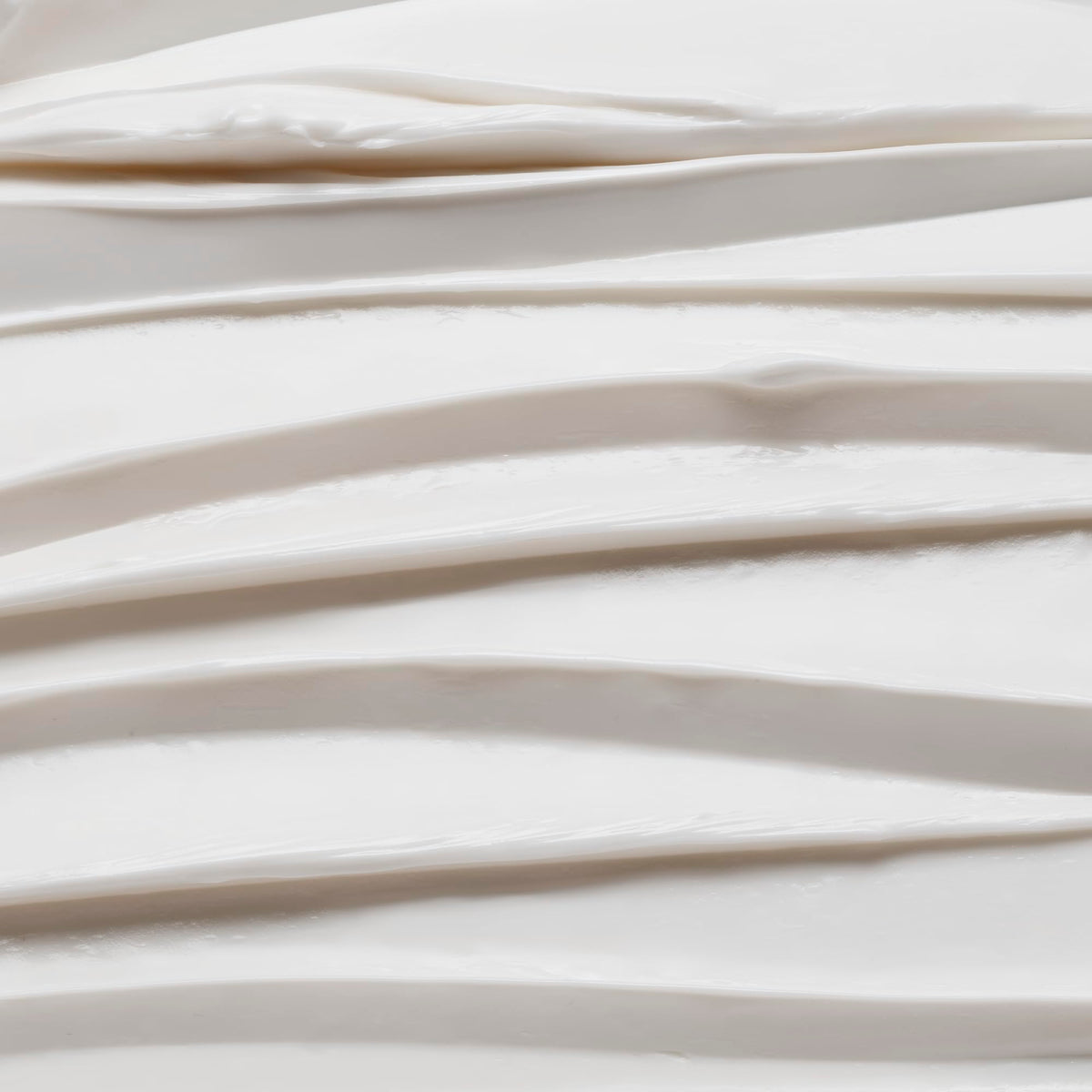 Le Monde Gourmand packaging beside coconut and vanilla pods evokes indulgence.
