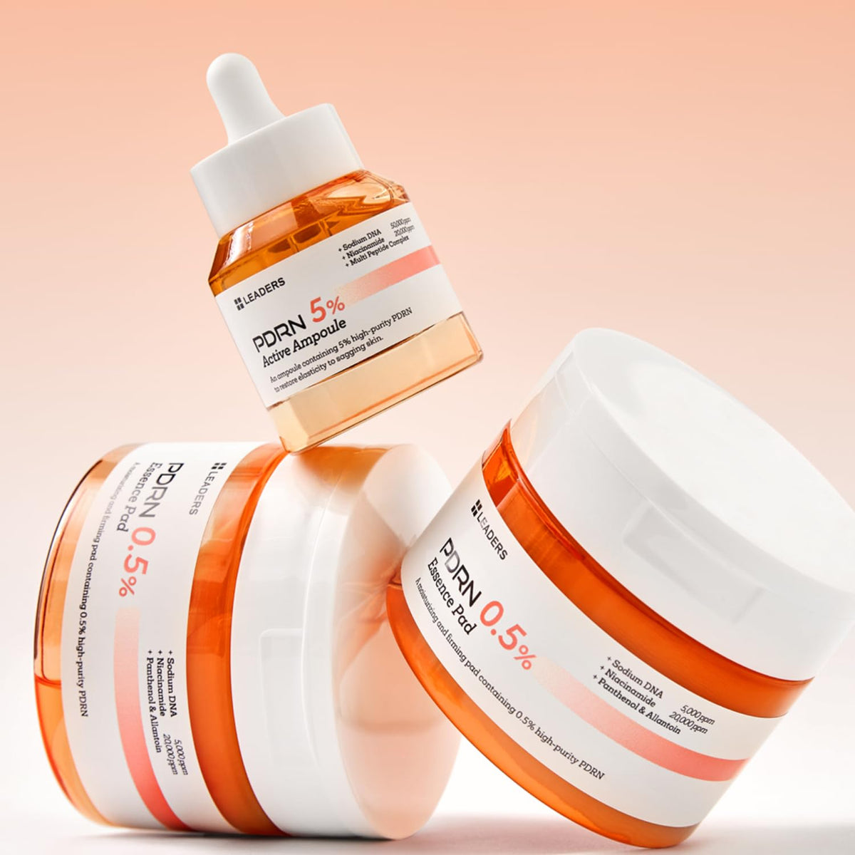 LEADERS ampoule box with soft glow indicating radiant, revitalized skin potential.