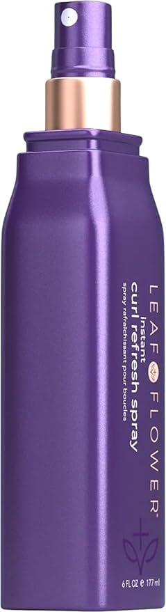 Leaf & Flower Instant Curl Refresh Spray mist on curls for refreshed definition.