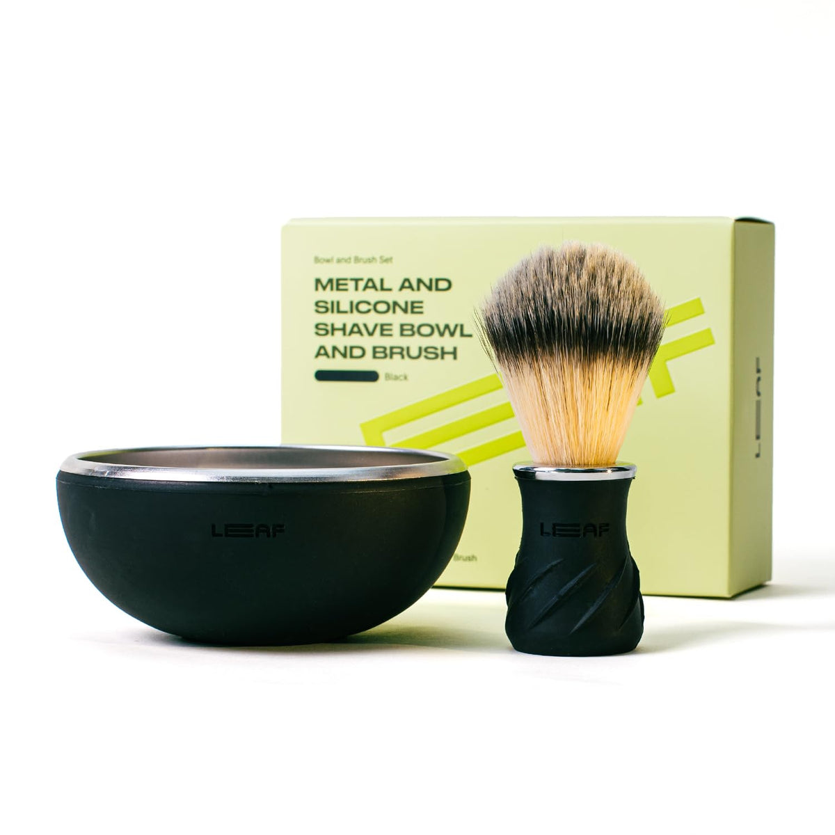 Leaf Shave bowl and brush set with stainless steel core and silicone wrap for secure, non-slip grip.