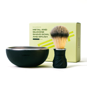 Leaf Shave bowl and brush set with stainless steel core and silicone wrap for secure, non-slip grip.