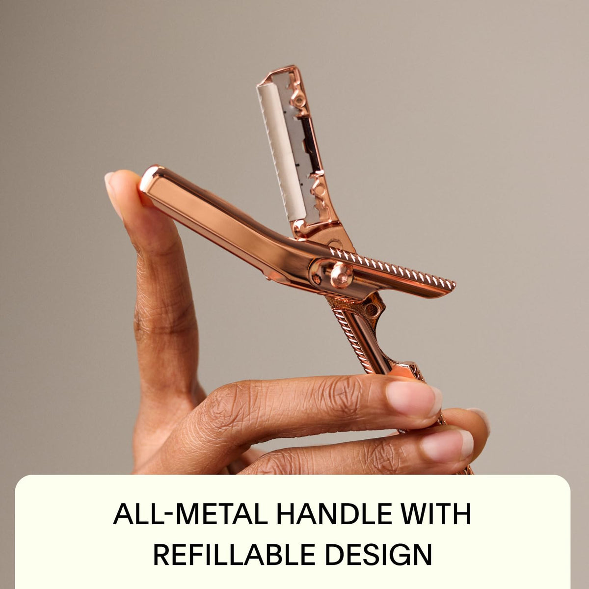 Leaf Shave Leaf Dermaplaner Mercury in-hand usage shows comfortable control