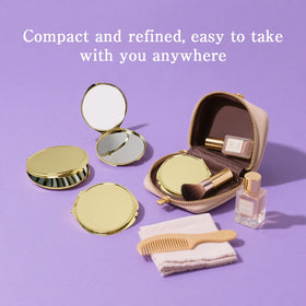 LECEHIVO gold compact mirror close-up highlighting clear reflection.