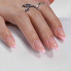 Leefrei nails on hand with pink glossy finish for salon-like look.