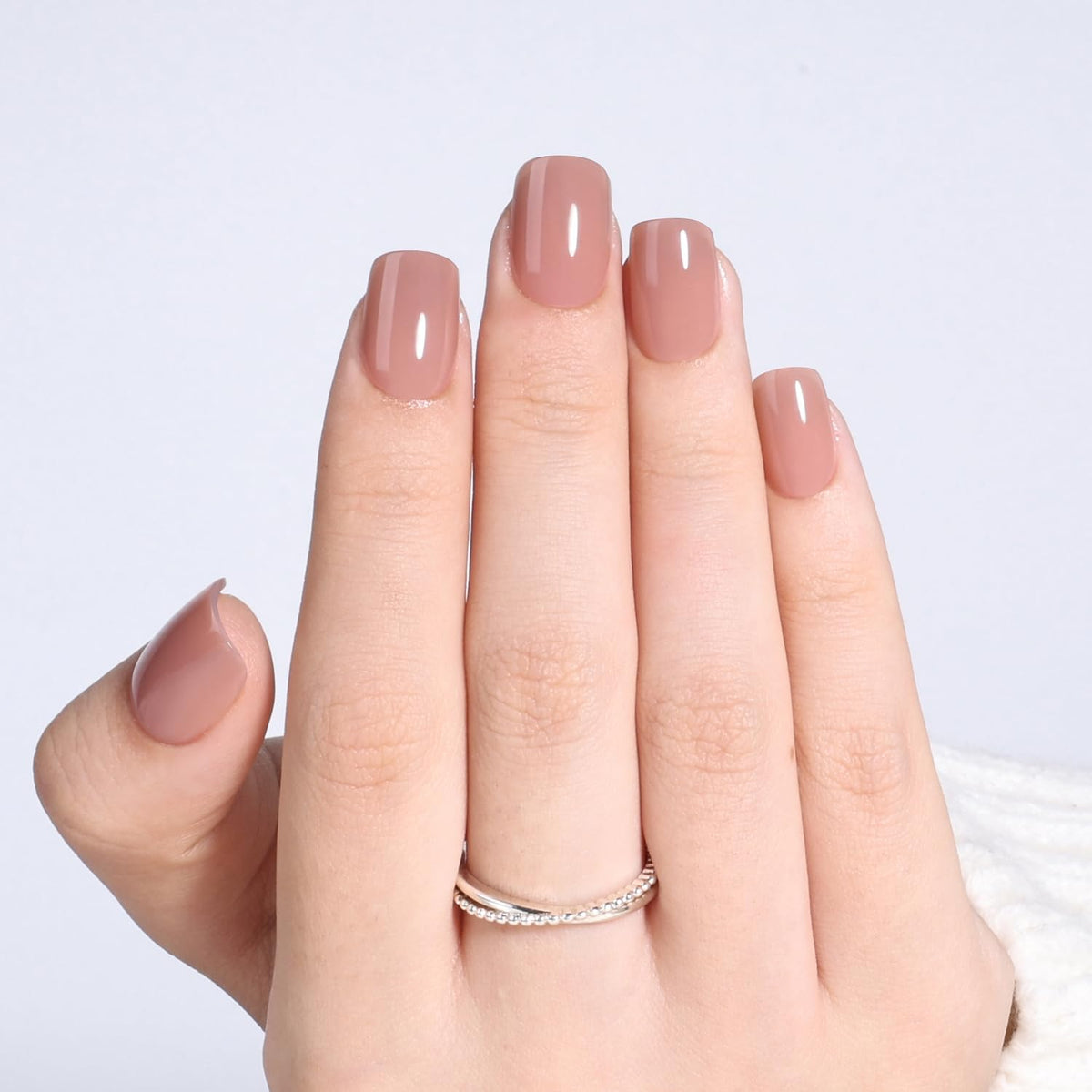 Leefrei Soft Mocha Nude nails with short square tips for easy at-home manicure.