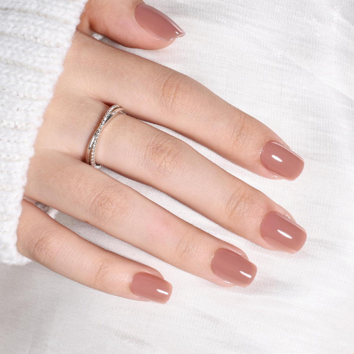 Leefrei Soft Mocha Nude nails close-up showing glossy finish and natural look.