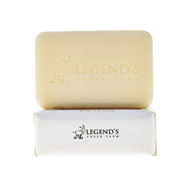 Legend's Creek unscented goat milk soap on a bathroom shelf.