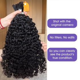 Lemoda Burmese curly hair on model demonstrates versatile knotless braid styling.