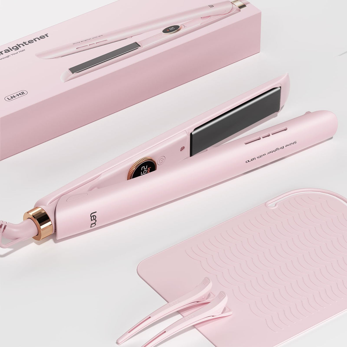 LENA H2 flat iron with titanium plates for smooth one-pass straightening.