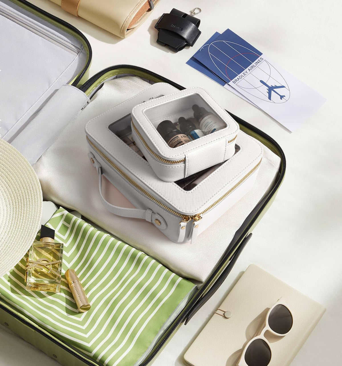 Inside view reveals organized compartments for brushes and small items.