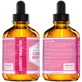 Face application with Leven Rose carrot seed oil on fingertips.