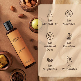 Life & Pursuits Turmeric Body Oil ingredients include turmeric and coconut oil for nourishment.