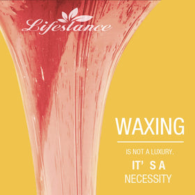 Lifestance pink hard wax being applied to skin for smooth removal