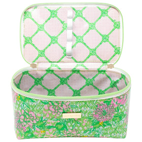 Lilly Pulitzer Lime Feeling Good cosmetic bag top handle for on-the-go carrying.