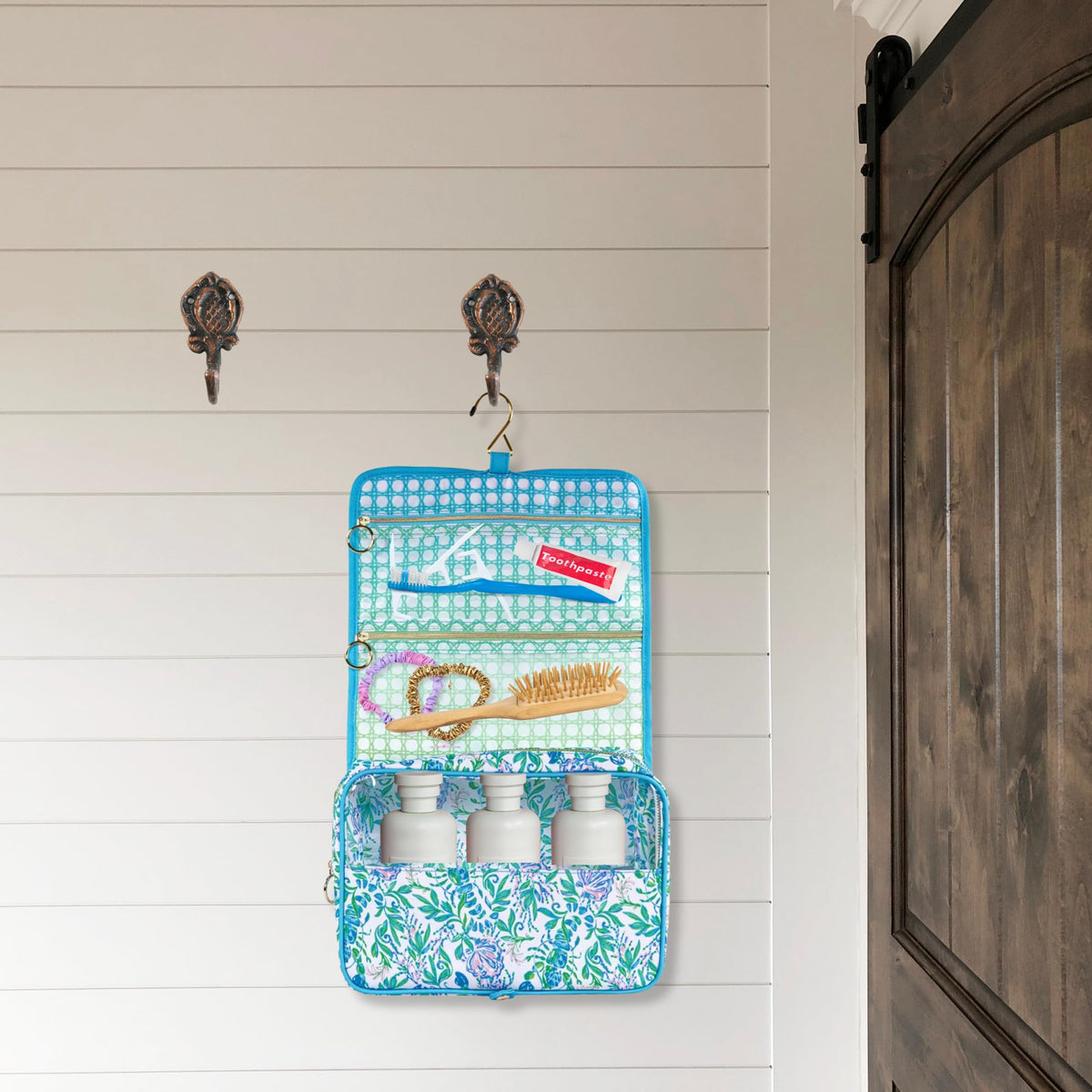 Lilly Pulitzer compact travel organizer sized for easy packing on trips.
