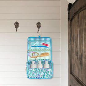 Lilly Pulitzer compact travel organizer sized for easy packing on trips.