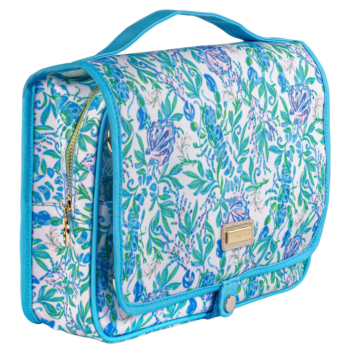 Lilly Pulitzer travel toiletry bag with handle for easy hanging during trips.