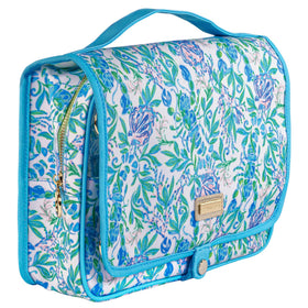 Lilly Pulitzer travel toiletry bag with handle for easy hanging during trips.