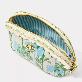 Gold logo plaque detail on Lilly Pulitzer vegan leather pouch highlights signature branding.