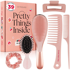 Lily England detangling brush ready to glide through knots for a smooth style