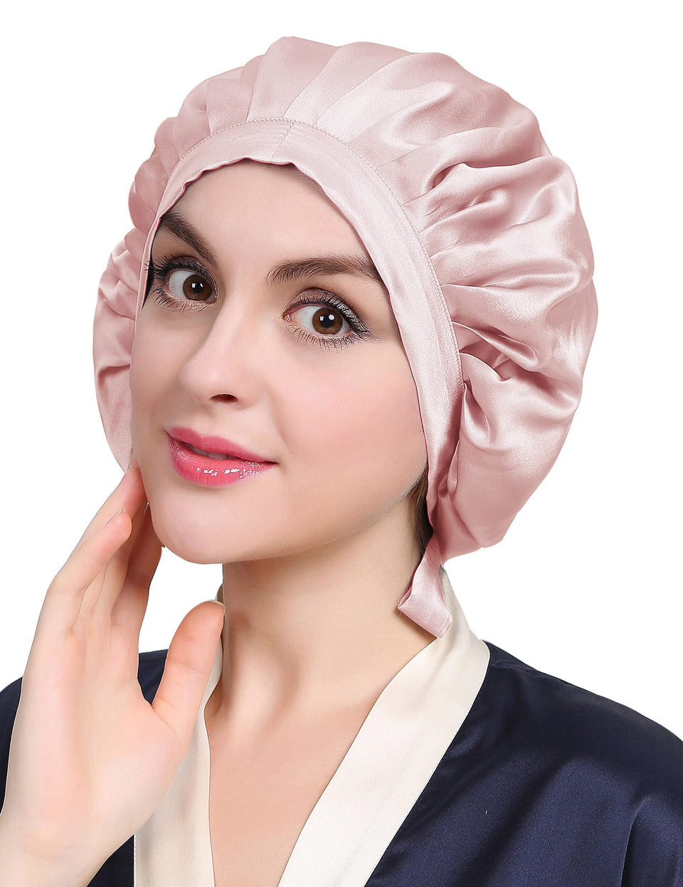 LilySilk Rosy Pink Silk Bonnet worn on head for gentle overnight hair protection