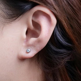 Limerencia 4mm cubic zirconia stud adds sparkle for a polished look.