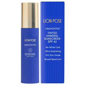 Lion Pose UNGHOSTED bottle pour showing easy, light mineral sunscreen application