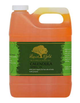 Liquid Gold Inc calendula oil bottle pour for smooth daily skin hydration.