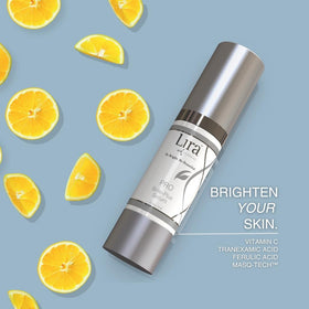 Hands apply Lira Clinical PRO Brite-Plus Serum during morning routine