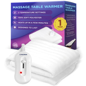 LivaClean massage table warmer on a professional table providing spa-grade warmth