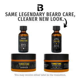 Live Bearded Tombstone beard butter tub resting on wood, offering moisture and ease.