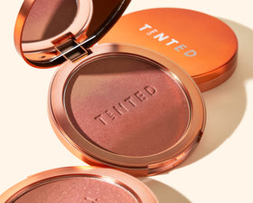 Live Tinted Huebeam gradient bronzer duo pan shows silky pigment swirls.