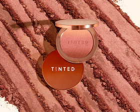 Live Tinted Huebeam natural sunkissed glow on cheekbones.