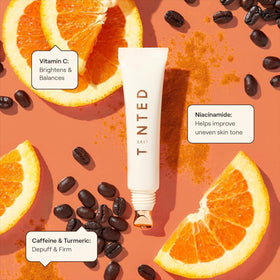 Close-up of Live Tinted Superhue Eye Cream texture showing rich hydration.