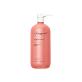 Living Proof Curl Conditioner bottle highlighting hydrating, detangling formula.