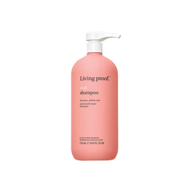 Living Proof Curl Shampoo bottle front view highlights gentle cleansing for wavy to coily hair.