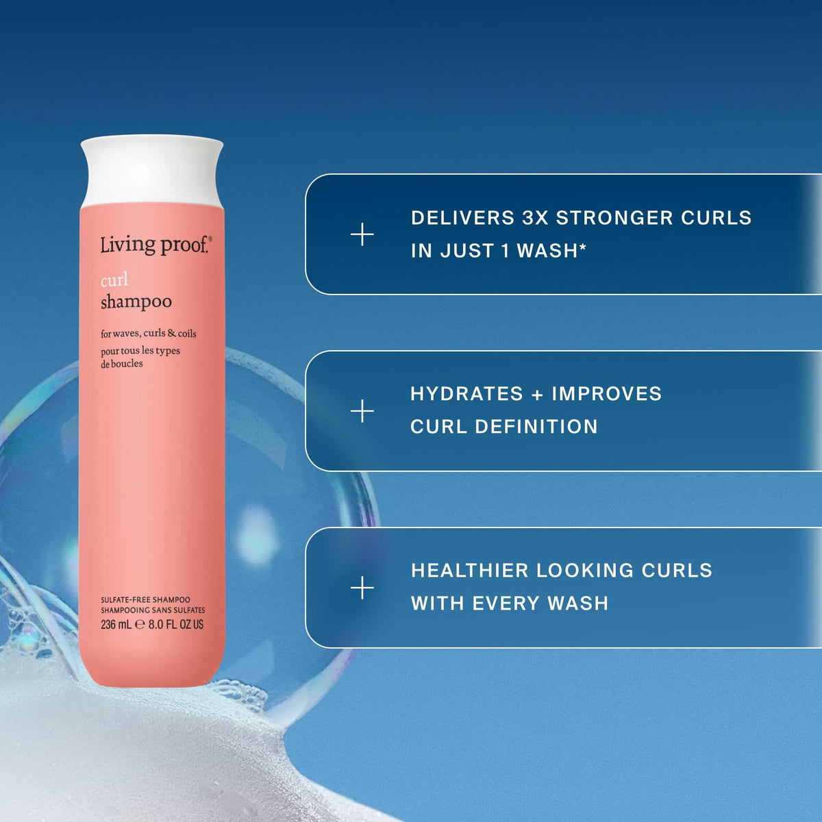 Living Proof Curl Shampoo hair-waves image demonstrates defined curls and natural shine.