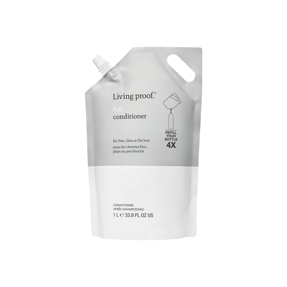 Living Proof Full Conditioner bottle demonstrates volumizing, weightless fullness.