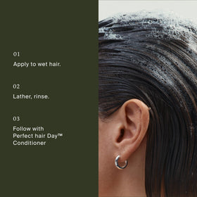 Living Proof Perfect Hair Day Shampoo close-up on label highlighting premium care
