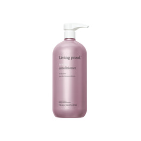 Living Proof Restore Conditioner bottle boosts smoother, shinier hair.