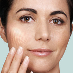 Soft cloth polishing away dull skin after applying Cleanse & Polish.