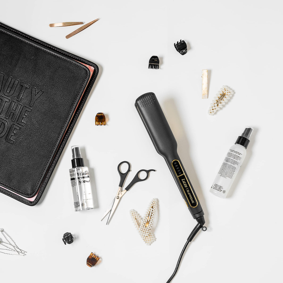 Lizze Supreme 1.5 Pro flat iron with compact, lightweight design.